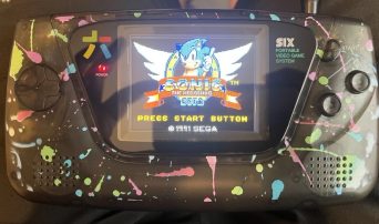 Sega Game Gear Displaying Sonic the Hedgehog