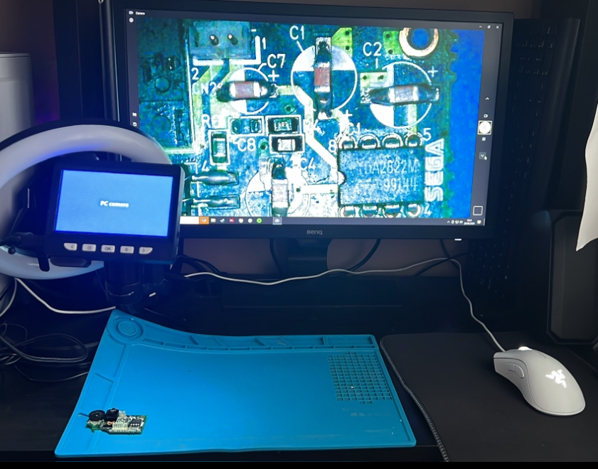 Workspace with Microscope and Monitor